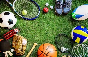 Physical education equipment including football, basketball, volleyball, badminton racket, tennis racket, baseball glove, running shoes